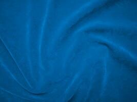 blu velluto tessuto struttura Usato come sfondo. oceano colore felpa tessuto sfondo di morbido e liscio tessile Materiale. schiacciato velluto .lusso Marina Militare tono per seta. foto