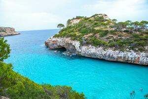 calo des moro, maiorca, Spagna. bellissimo spiaggia paesaggio, esotico tropicale isola natura, blu mare acqua, oceano onde, estate vacanze vacanza. foto