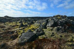 aspro lava campo con nero vulcanico rocce foto