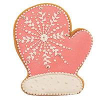 nuovi anni. guanto rosa biscotto allo zenzero su sfondo bianco. guanto di panpepato rosa di natale.