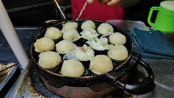 processi per cucinando takoyaki maggior parte popolare delizioso merenda foto