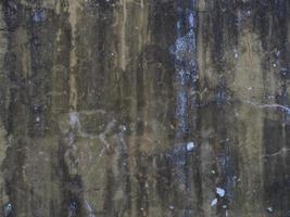 vecchio muro di cemento come trama di sfondo con colore marrone e blu foto