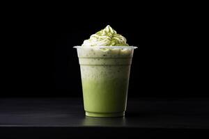 verde tè frappucino con frustato crema nel un' porta via tazza isolato su buio sfondo. ai generato foto