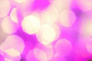 bellissimo brillante rosa sfondo. scintillare festivo sfocato viola bokeh foto