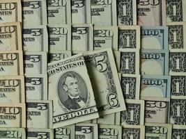 sfondo per temi di economia e finanza con denaro in dollari americani foto