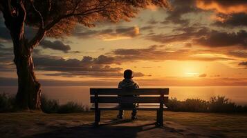 un' panchina nel davanti di un' tramonto Visualizza con un' ragazzo seduta su esso. silhouette concetto foto