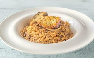 risotto con porcini funghi foto