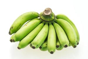 banana verde su bianco foto