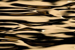 fluente ondulazione modello, d'oro sfondo, 3d resa. foto