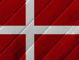 bandiera di Danimarca su un' strutturato sfondo. concetto collage. foto