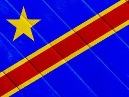 bandiera di democratico repubblica di il congo su un' strutturato sfondo. concetto collage. foto