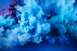 astratto blu polvere schizzato sfondo in mostra un' vivace colorato nube scoppiando via piace un' holi dipingere esplosione foto