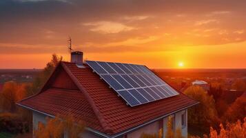 alternativa elettricità fonte. solare pannelli, fotovoltaico su il rosso tetto di un' Casa e un' bellissimo cielo con il ambientazione sole. concetto di sostenibile risorse. generativo ai foto