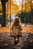 un' poco ragazza seduta su un' swing nel un' parco ai generativo foto