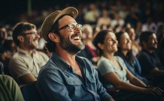 un' gruppo di persone siamo ridendo nel un auditorium foto