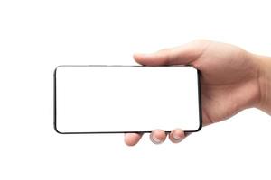 mano che tiene smartphone su sfondo bianco con tracciato di ritaglio foto