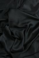 trama, sfondo, modello. trama del tessuto di seta. bellissimo tessuto di seta morbida. foto