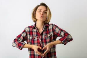 giovane emotivo donna nel scacchi camicia foto