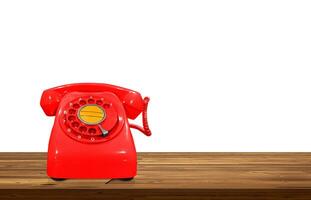 rosso Vintage ▾ telefono su di legno tavolo isolato su bianca sfondo. foto