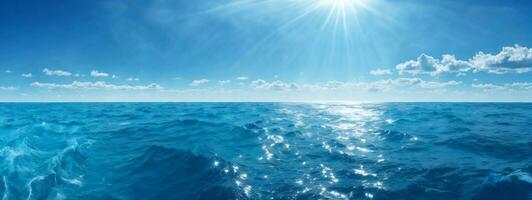 blu oceano panorama con sole riflessione, il vasto Aperto mare con chiaro cielo, ondulazione onda e calma mare con bellissimo luce del sole. ai generato foto