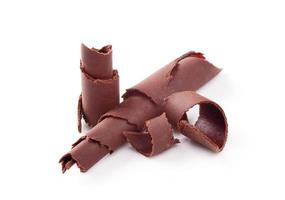 riccioli di cioccolato su sfondo bianco foto