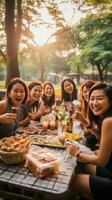 pieno di divertimento picnic con bene azienda foto