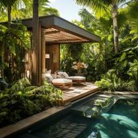 elegante bordo piscina Cabanas con lussureggiante tropicale fogliame. foto