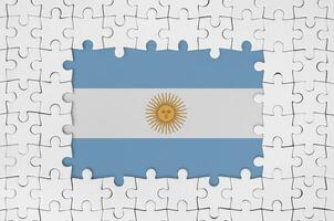 argentina bandiera nel telaio di bianca puzzle pezzi con mancante centrale parte foto