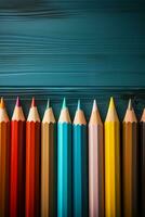 un' riga di colorato matite foderato su contro un' blu sfondo. ai generativo foto