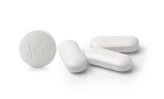 compressa medica della pillola isolata su fondo bianco foto