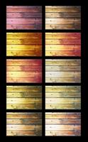 elencato di legno con chiodi in stile country di vari colori su sfondo nero foto