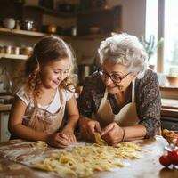 nonna insegnamento nipotina per rendere pasta foto