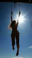 trapezio. oscillante e capovolgimento alto sopra il terra foto