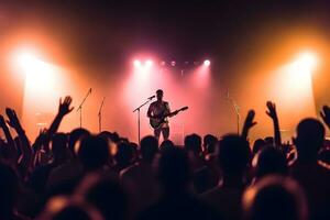 vivere musica concerto, applauso folla nel davanti di luminosa palcoscenico luci foto