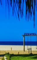 romantico Paradiso swing su il spiaggia nel puerto escondido Messico. foto