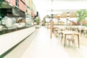 sfocatura astratta food court nel centro commerciale per lo sfondo foto