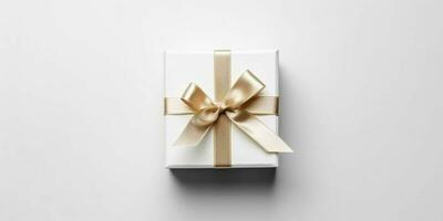 bianca regalo scatola con oro nastro su bianca sfondo. Natale regalo. generativo ai foto
