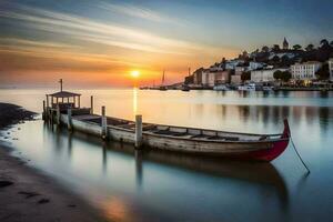 un' barca si siede su il riva a tramonto. ai-generato foto