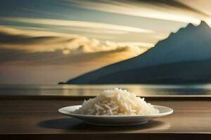 un' piatto di riso su un' tavolo nel davanti di un' montagna. ai-generato foto