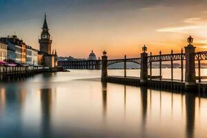 il sole è ambientazione al di sopra di un' città con un' ponte e orologio Torre. ai-generato foto