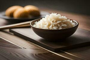 un' ciotola di riso e bastoncini su un' di legno tavolo. ai-generato foto