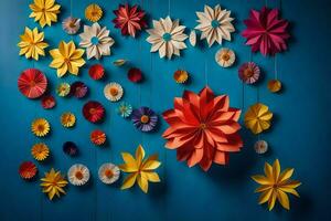 colorato carta fiori sospeso a partire dal stringhe su un' blu parete. ai-generato foto