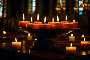 candele siamo illuminato nel un' Chiesa con macchiato bicchiere finestre. ai-generato foto