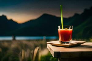 un' bicchiere di rosso succo su un' tavolo nel davanti di un' montagna. ai-generato foto