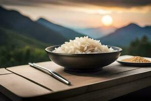 un' ciotola di riso e un' cucchiaio su un' tavolo nel davanti di un' montagna. ai-generato foto