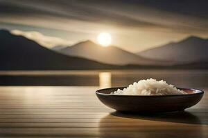 un' ciotola di riso su un' di legno tavolo nel davanti di un' lago. ai-generato foto