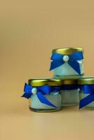 profumato candela avvolto con arco blu nozze i regali favori per ospiti foto