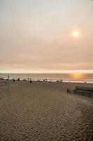 scene e dintorni della spiaggia di Huntington a novembre foto