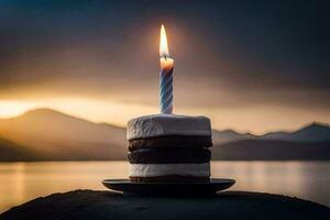 un' torta con un' illuminato candela su superiore di un' montagna. ai-generato foto