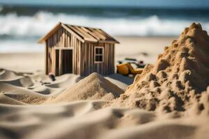 un' miniatura Casa e sabbia castello su il spiaggia. ai-generato foto